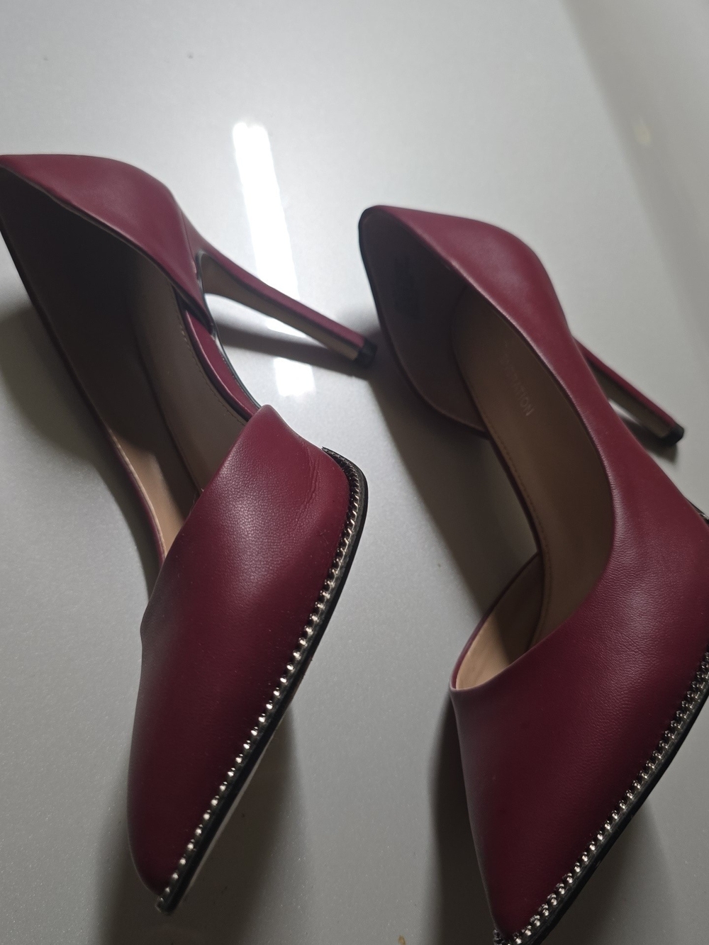 BCBGeneration Burgundy Pointed-Toe Pumps with Chain-Edge Trim